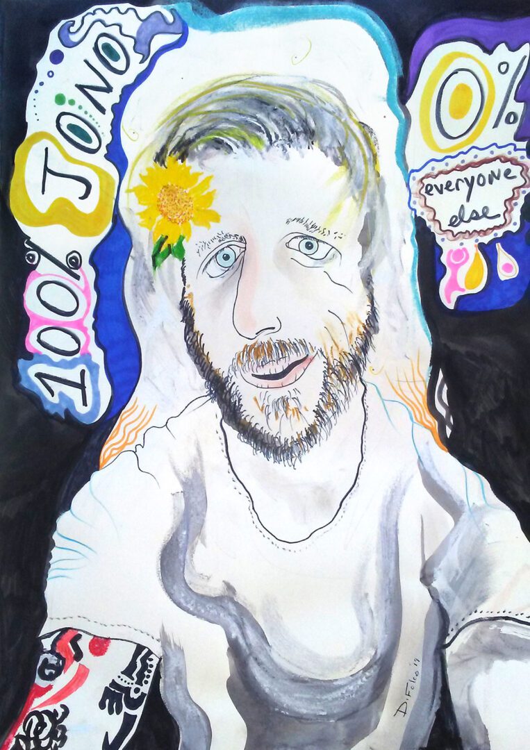 A man with a beard and flower in his hair.